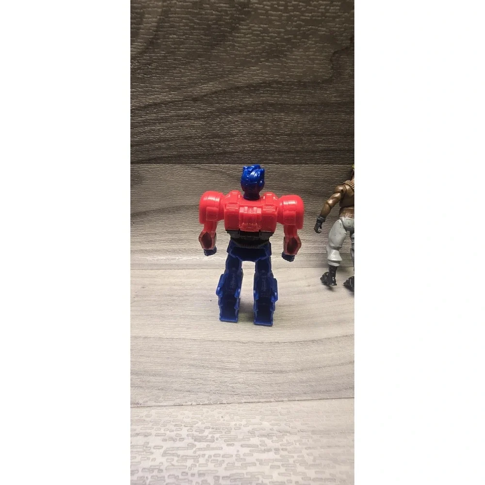 Lot Of 4 Action Figures ( Sarge, Transformer, Bruce Wayne & Jazware )